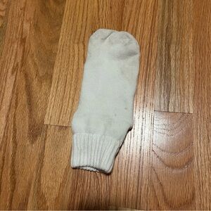 One white athletic sock, used